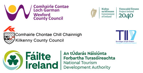 Īrijas valdības, Veksfordas apgabala padomes, Kilkenijas apgabala padomes, Īrijas transporta infrastruktūras un Bord Failte logotipi